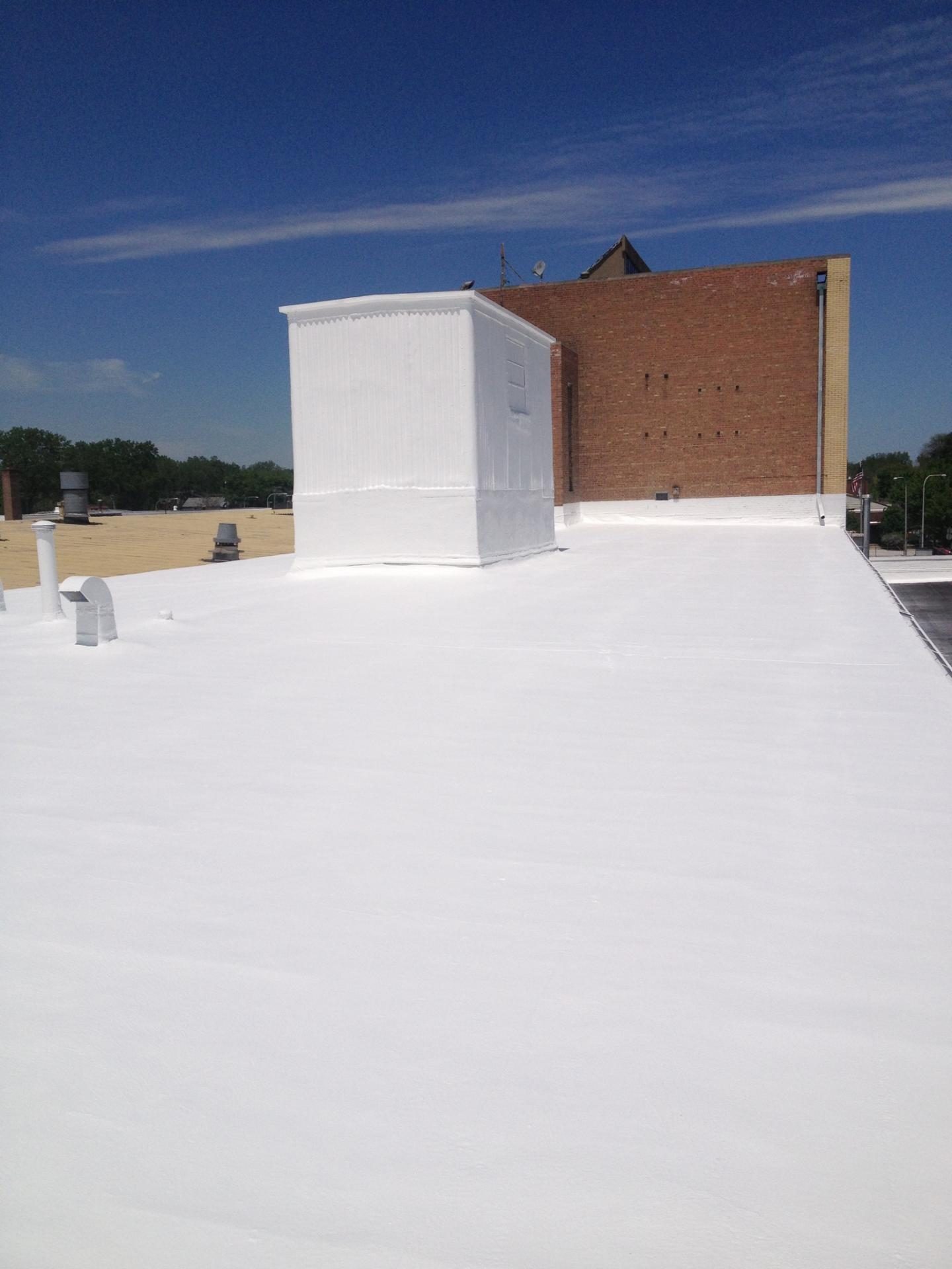 Uniform color finish on coated shingles